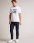FAROW-Tops-Our FAROW T-shirt is crafted from 100% cotton and has a regular fit for chilled weekends and lounging around. It features a short-sleeved design with branded film countdown graphic at the front. Adding to basket in 3, 2, 1...The fabric of this product is made of 100% organic cotton. Organic cotton has a proven lower environmental impact than conventional cotton, as it reduces water usage, greenhouse gas emissions, and eliminates the use of harmful chemicals in the farming process. T-shirt 100% co